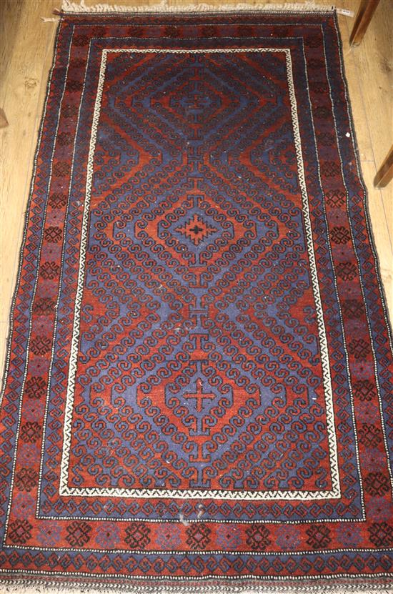 A small Belouch rug, woven with three lozenges Approx. 200 x 110cm